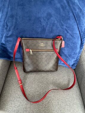 Coach Signature Crossbody Bag in Brown with Red Trim like new